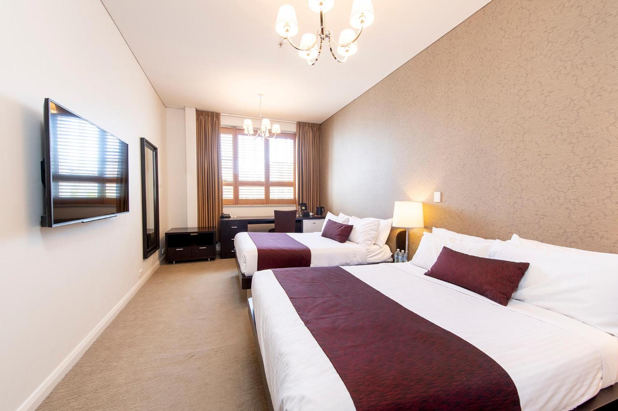 Family Room One King Bed Two Double Beds
